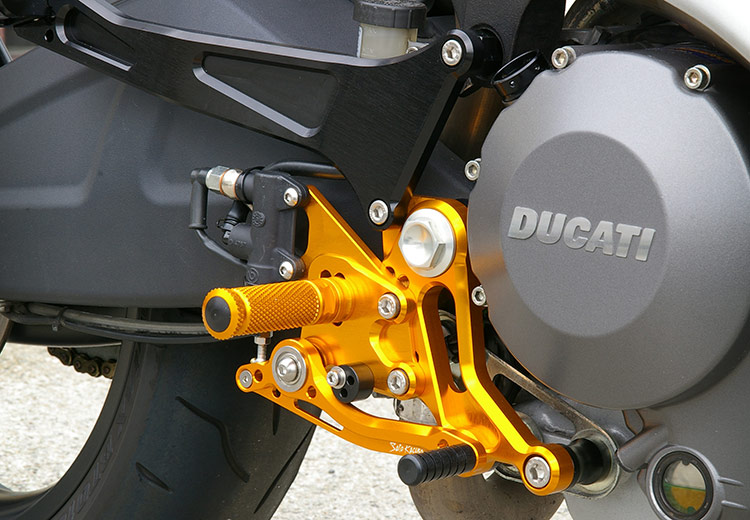 Sato Racing Ducati Monster 1100/S Rear Sets in Gold with optional Tandem Brackets in Black