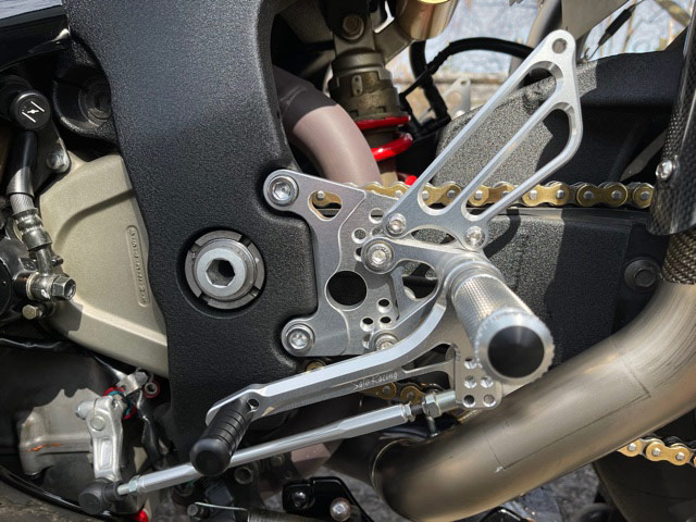 Sato Racing Rear Sets in Silver on an RC51