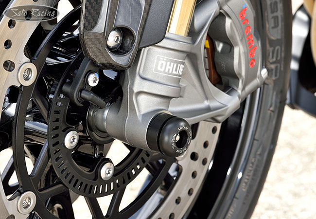 SATO RACING Front Axle Sliders on a Speed Triple RR