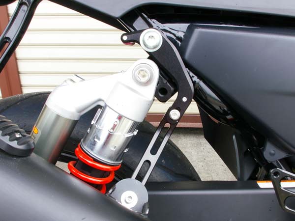 Sato Racing XR1200 Ride Height Adjuster with optional Canister Bracket